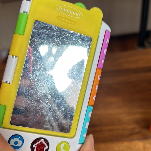 Multi-pack take along toys. Includes remote, phone and misc. book type toy. - Picture 4 of 11